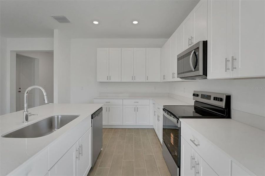 Furnished interior view inside a new home in Willowbrook North, Winter Haven (Image 12).