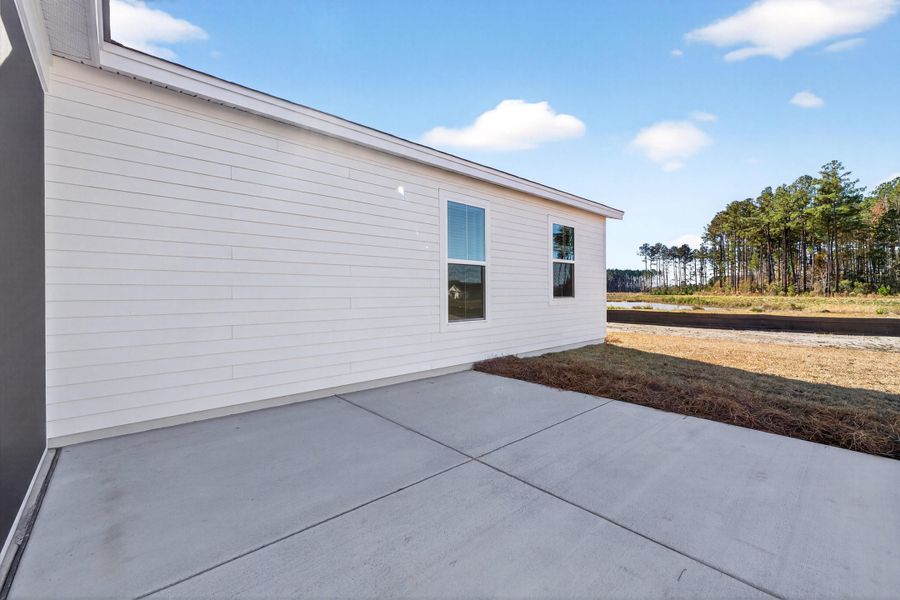 Exterior details and patio area of a home in , Summerville (Image 4).