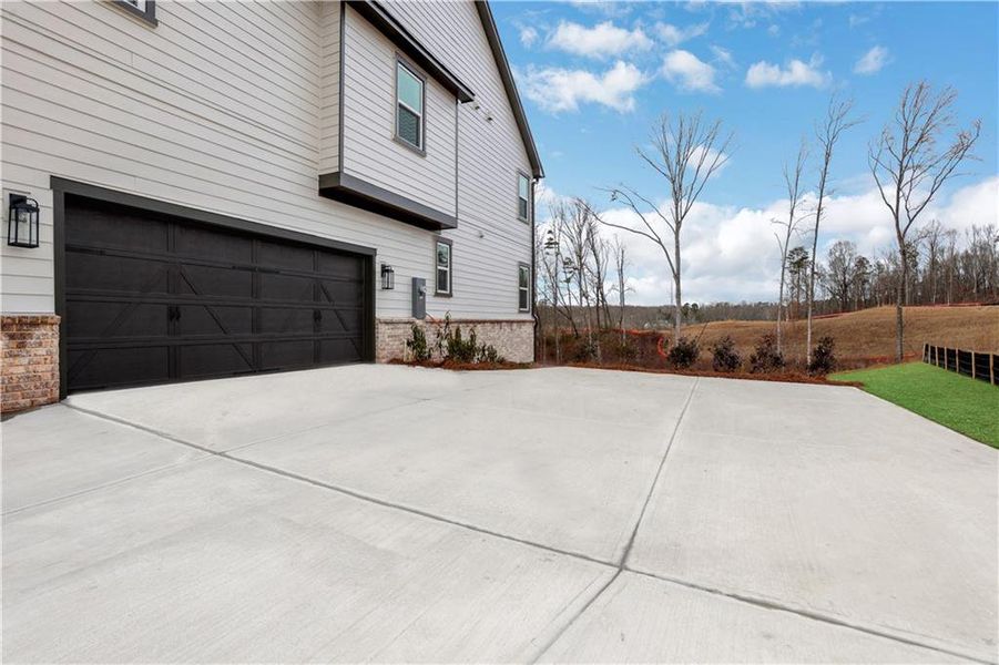 Exterior details and patio area of a home in Acacia, Cumming (Image 26). Exterior details and patio area of a home in Acacia, Cumming (Image 26).