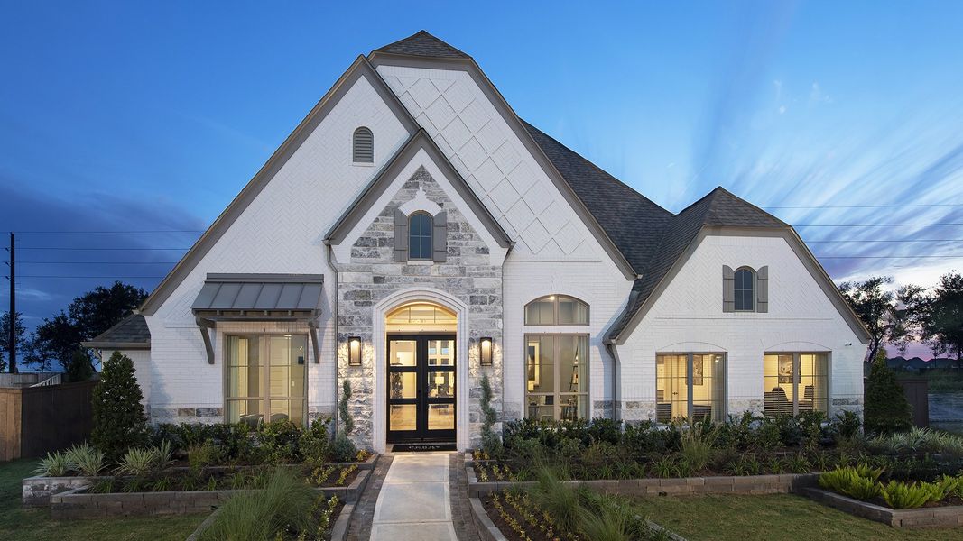 Representative exterior photo of a completed home built from the 3578W by Perry Homes in Lakes of Cane Island, Katy, TX (Image 23).