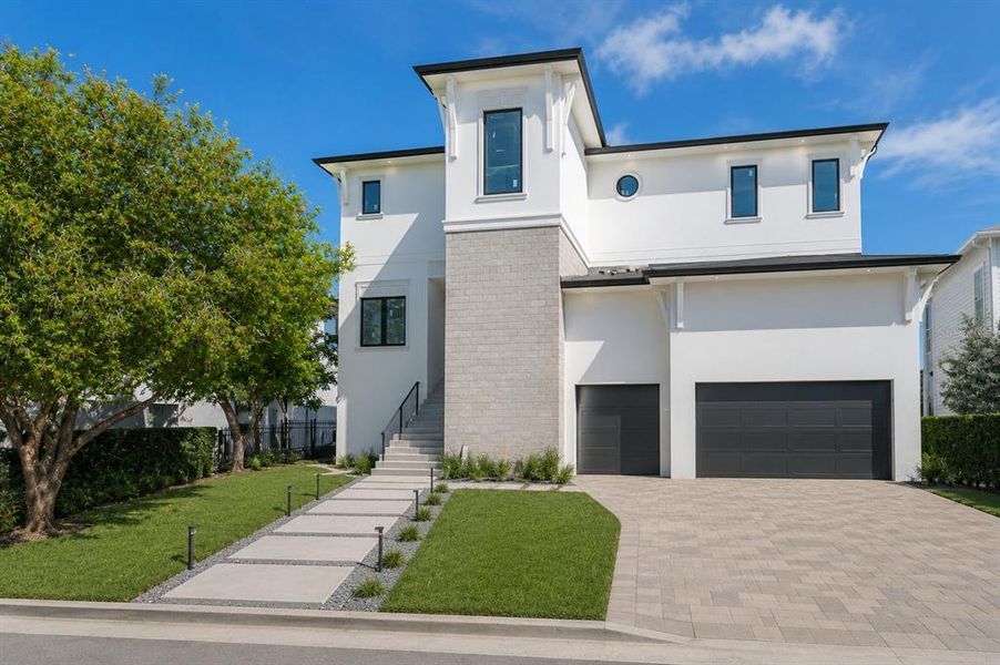 Front exterior of a new home in , Tampa, FL, highlighting curb appeal (Image 19). Front exterior of a new home in , Tampa, FL, highlighting curb appeal (Image 19).