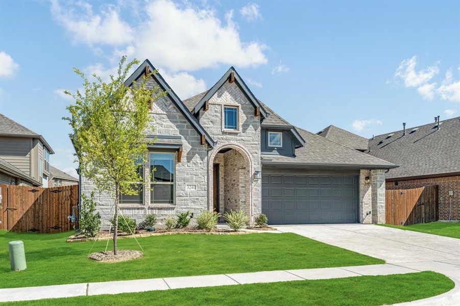 Front exterior of a new home in Ridge Ranch Classic 50, Mesquite, TX, highlighting curb appeal (Image 24). Front exterior of a new home in Ridge Ranch Classic 50, Mesquite, TX, highlighting curb appeal (Image 24).