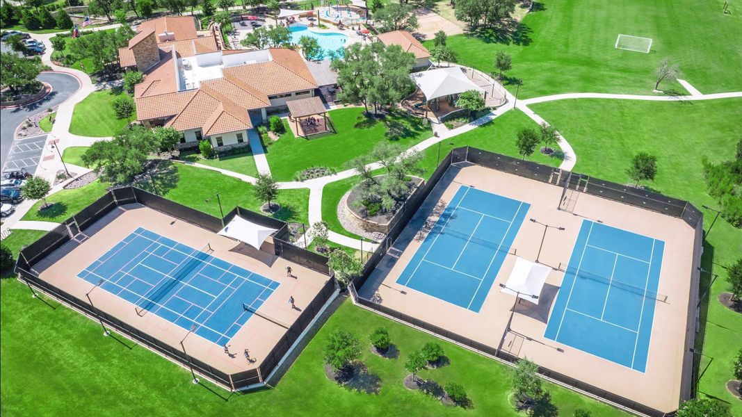 Premium community amenities include professional-grade sports courts and a resort-style swimming pool.