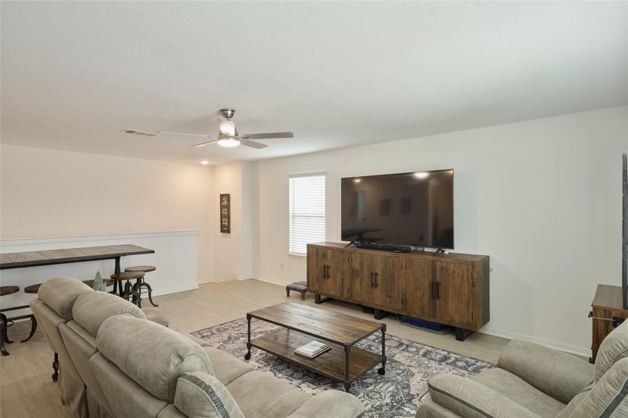 Furnished interior view inside a new home in The Pines At Seven Coves, Willis (Image 36).