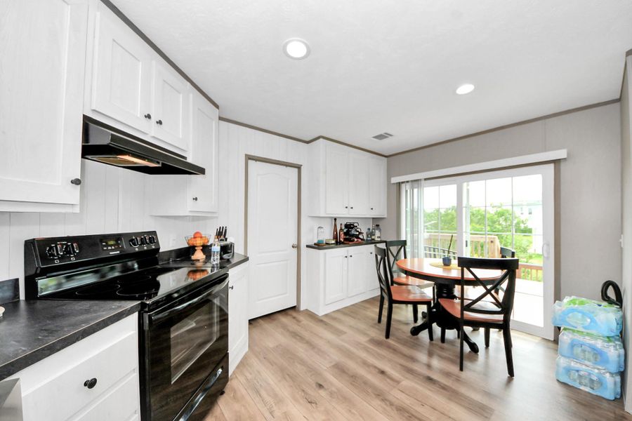 Furnished interior view inside a new home in , Dickinson (Image 35).