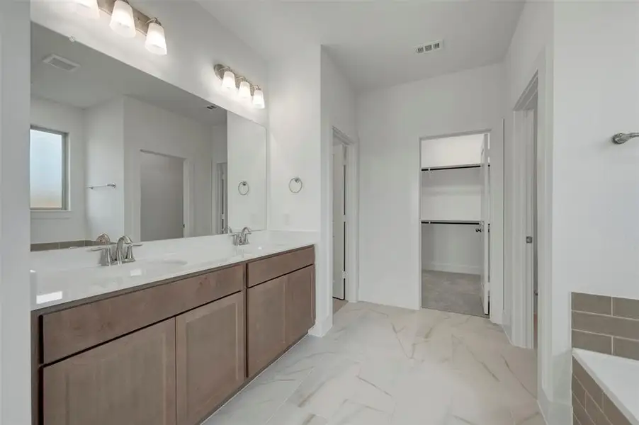 Furnished interior view inside a new home in Lily Creek at Sutton Fields, Aubrey (Image 8).