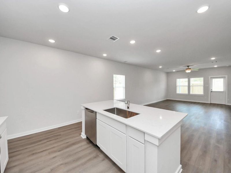Furnished interior view inside a new home in Caney Creek Place, Conroe (Image 10).