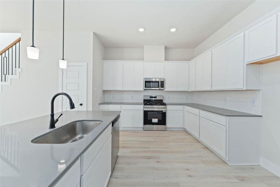 Furnished interior view inside a new home in Alicante, Houston (Image 4).