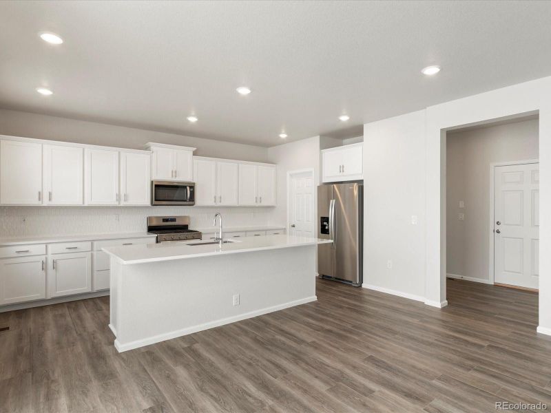 Furnished interior view inside a new home in Poudre Heights: The Alpine Collection, Windsor (Image 9).