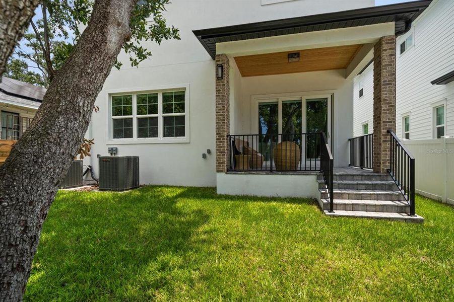 Front exterior of a new home in , Dunedin, FL, highlighting curb appeal (Image 22). Front exterior of a new home in , Dunedin, FL, highlighting curb appeal (Image 22).