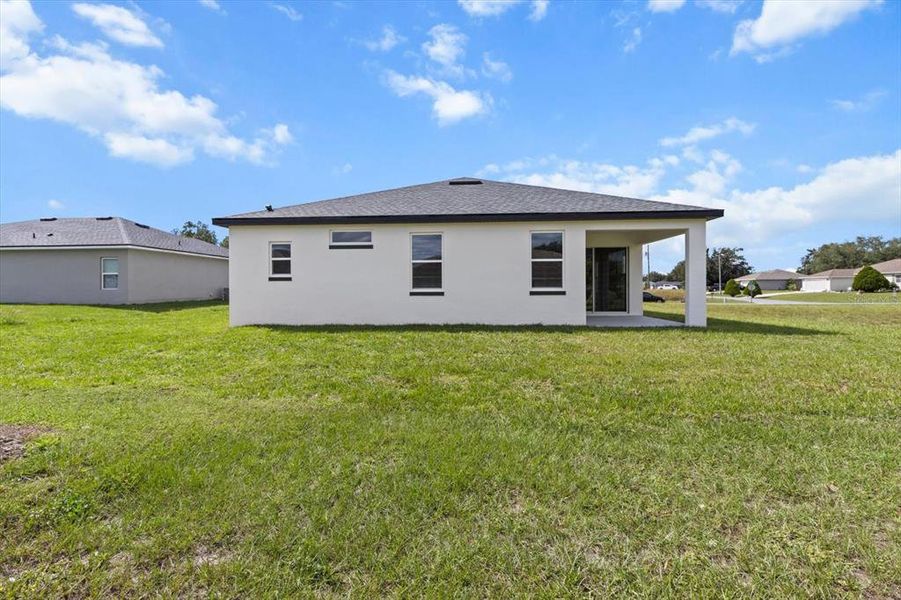 Front exterior of a new home in , Ocala, FL, highlighting curb appeal (Image 2).