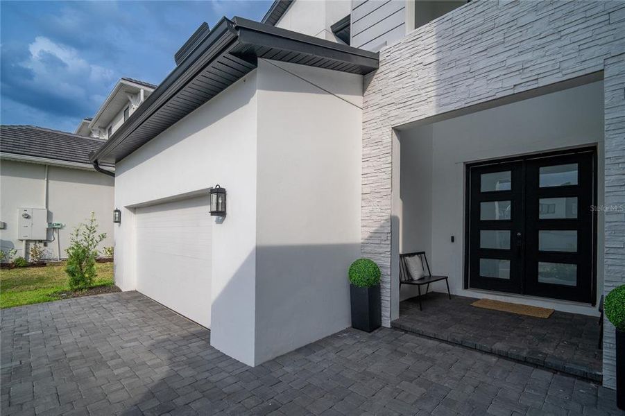 Front exterior of a new home in , Orlando, FL, highlighting curb appeal (Image 16).