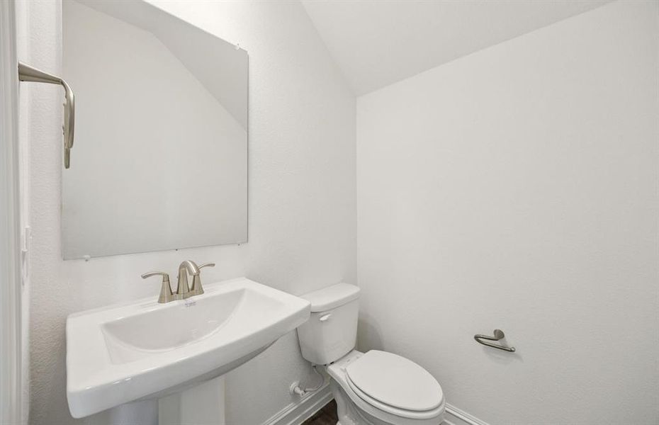 Powder room with elegant finishes *Real home pictured Powder room with elegant finishes *Real home pictured