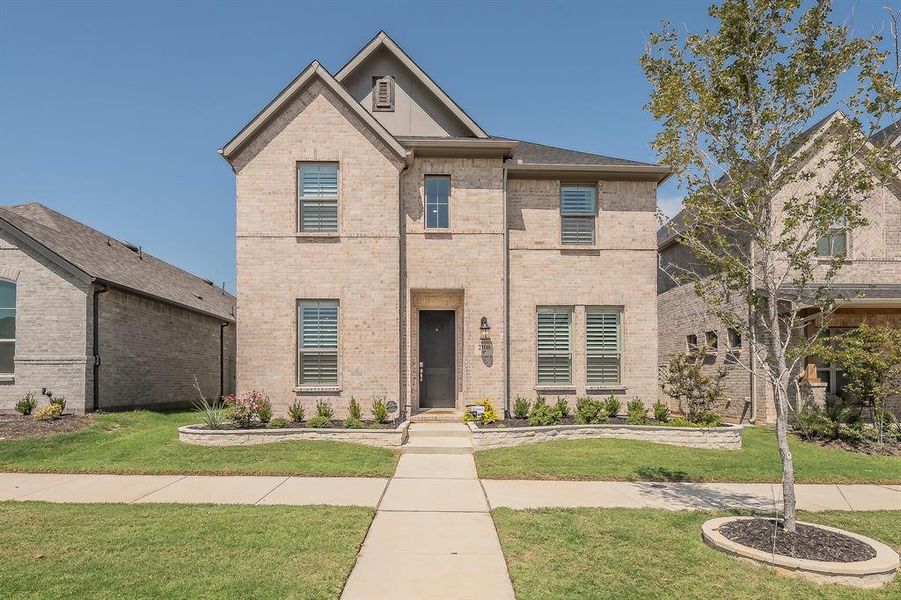 Front exterior of a new home in Pecan Square, Northlake, TX, highlighting curb appeal (Image 19).