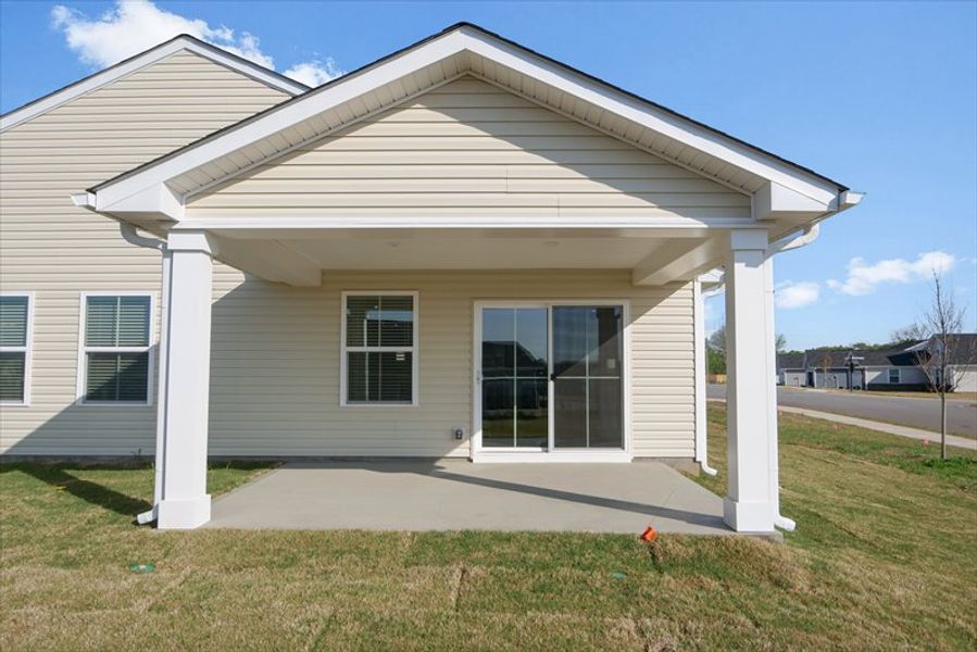 Exterior details and patio area of a home in Reidville Town Center Cottages, Duncan (Image 3).