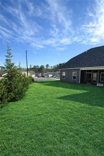 Exterior details and patio area of a home in Stratford at NatureWalk, Dallas (Image 27).