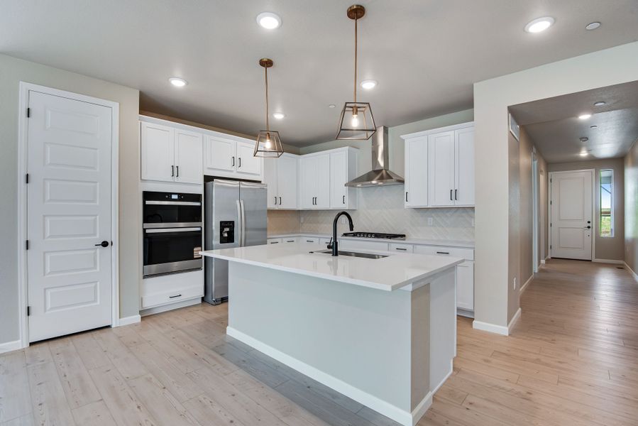 Furnished interior view inside a new home in Reunion, Commerce City (Image 6).