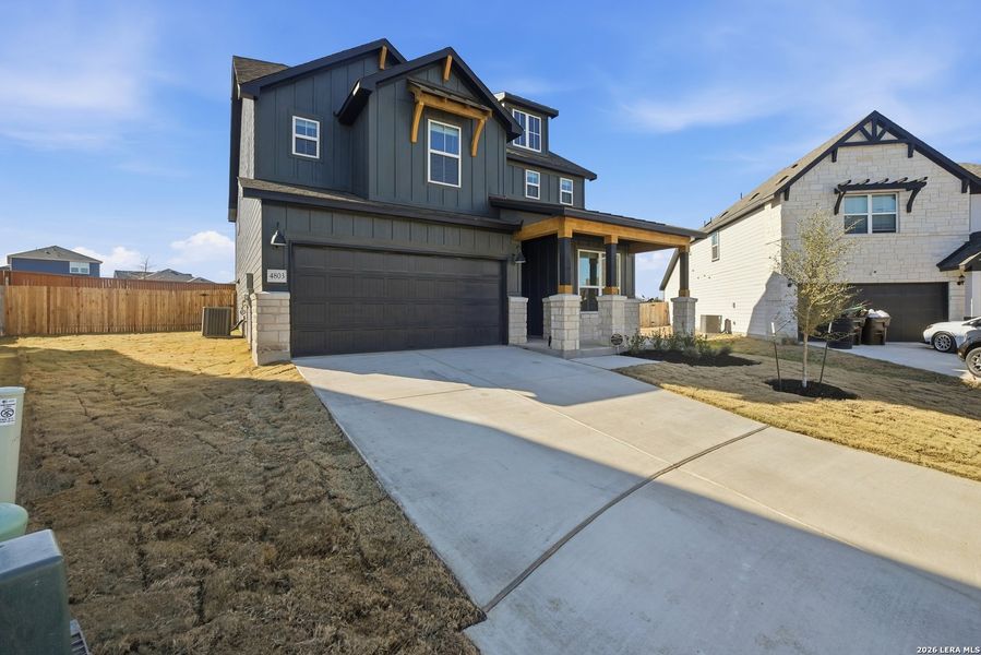 Front exterior of a new home in Horizon Ridge, San Antonio, TX, highlighting curb appeal (Image 18). Front exterior of a new home in Horizon Ridge, San Antonio, TX, highlighting curb appeal (Image 18).