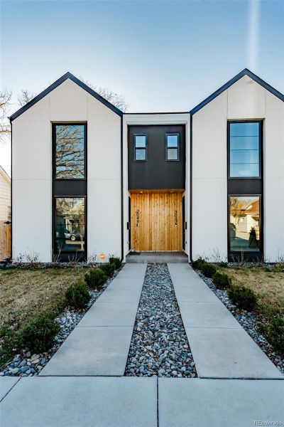 Front exterior of a new home in , Englewood, CO, highlighting curb appeal (Image 24).