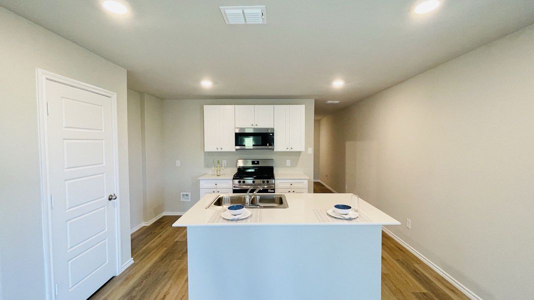Furnished interior view inside a new home in Sunnycreek, Crowley (Image 5).