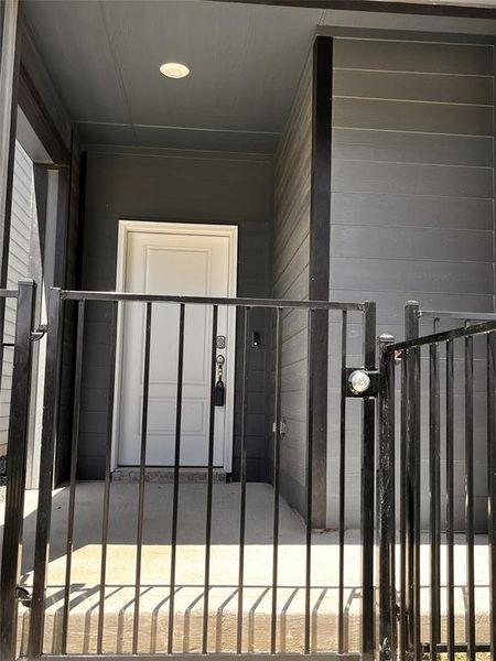 Front gate with lock.