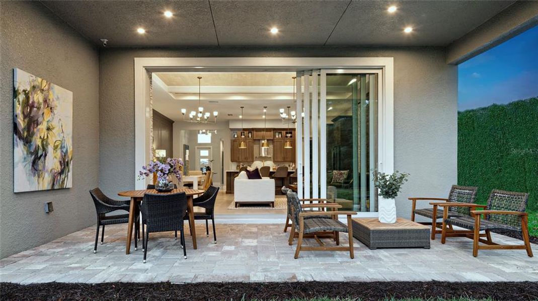 Exterior details and patio area of a home in The Reserve at Victoria, Deland (Image 20).