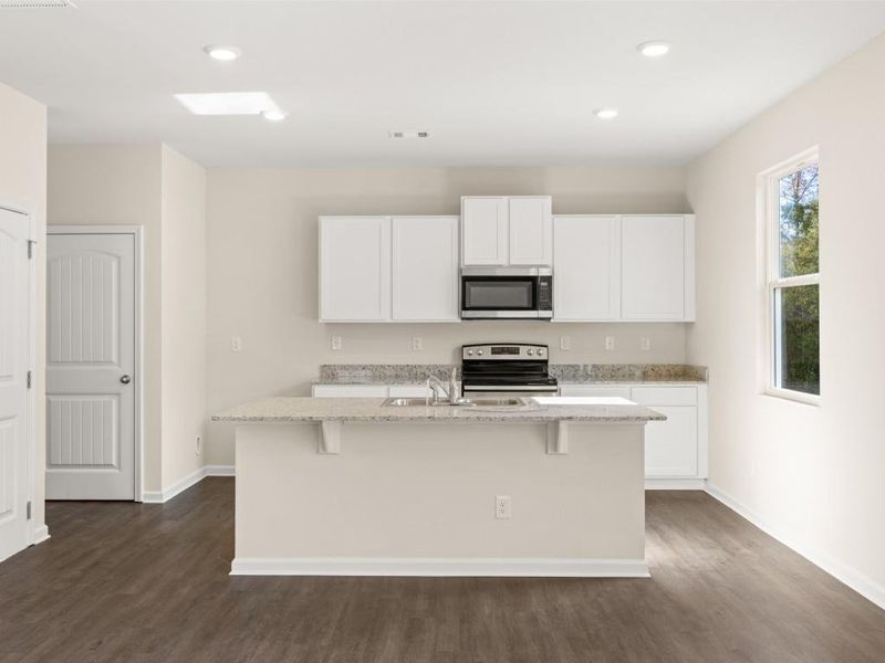 Furnished interior view inside a new home in Oaks at Cedar Grove, Fairburn (Image 5).