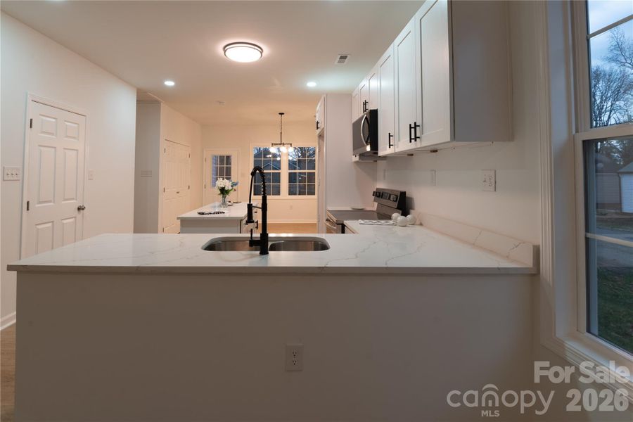 Furnished interior view inside a new home in , Stanley (Image 6).