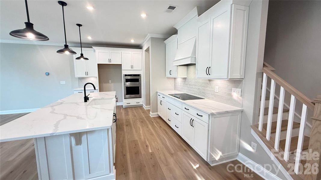 Furnished interior view inside a new home in The Townes at Wade Ardrey, Charlotte (Image 30).