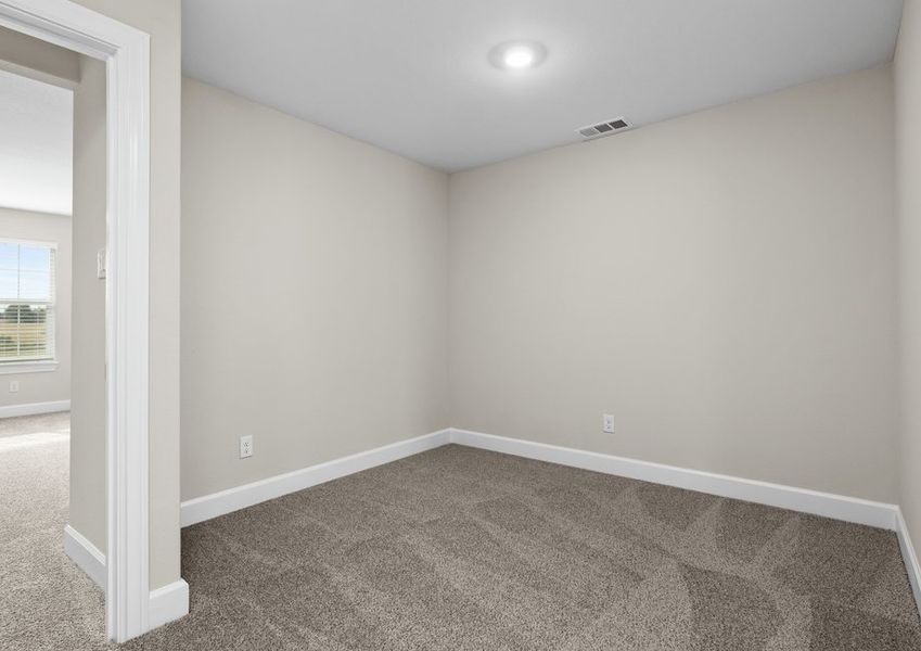 Upstairs, the loft gameroom is a versatile space.