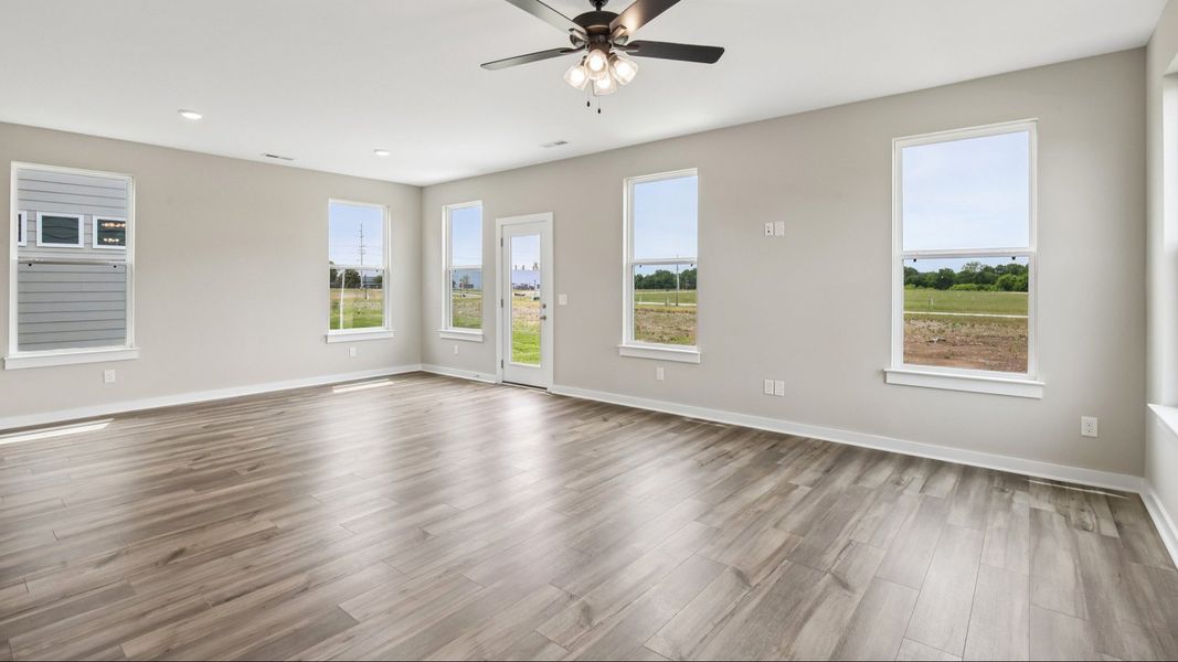 First Floor with hard surface flooring and bright natural light through windows
