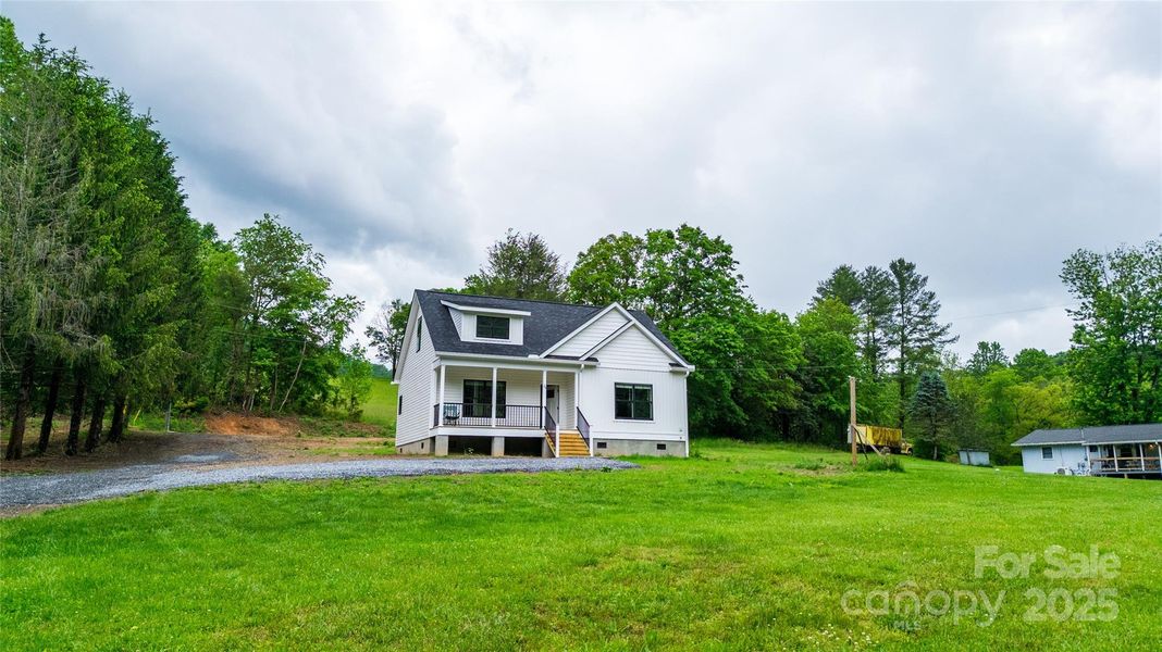 Front exterior of a new home in , Tuckasegee, NC, highlighting curb appeal (Image 18).
