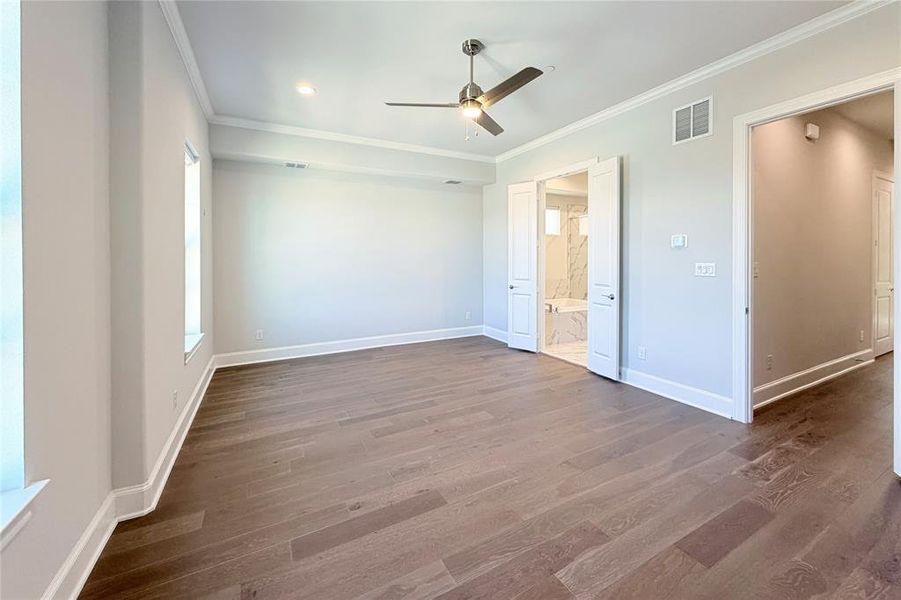 Progress photo of actual unit. Spacious primary suite.