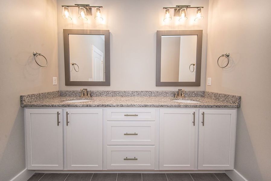 Representative furnished interior of a home built from the Beaumont Elite by Enchanted Homes in Pointe Summit, Slater-Marietta (Image 18).