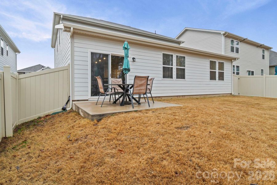 Exterior details and patio area of a home in Blue Sky Meadows, Monroe (Image 26).