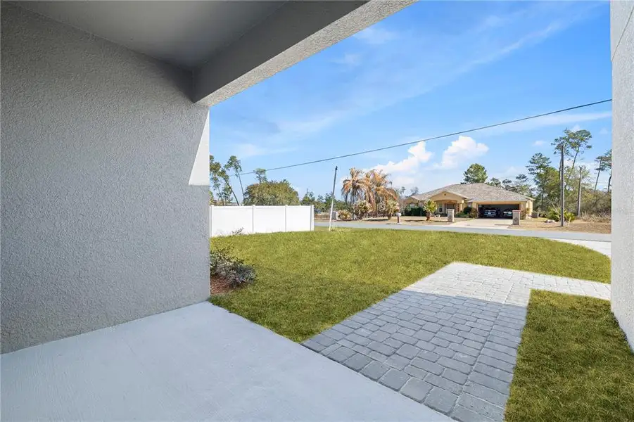 Exterior details and patio area of a home in , Ocala (Image 29).
