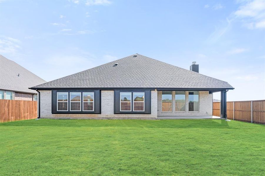 Exterior details and patio area of a home in Mockingbird Hills, Joshua (Image 4).