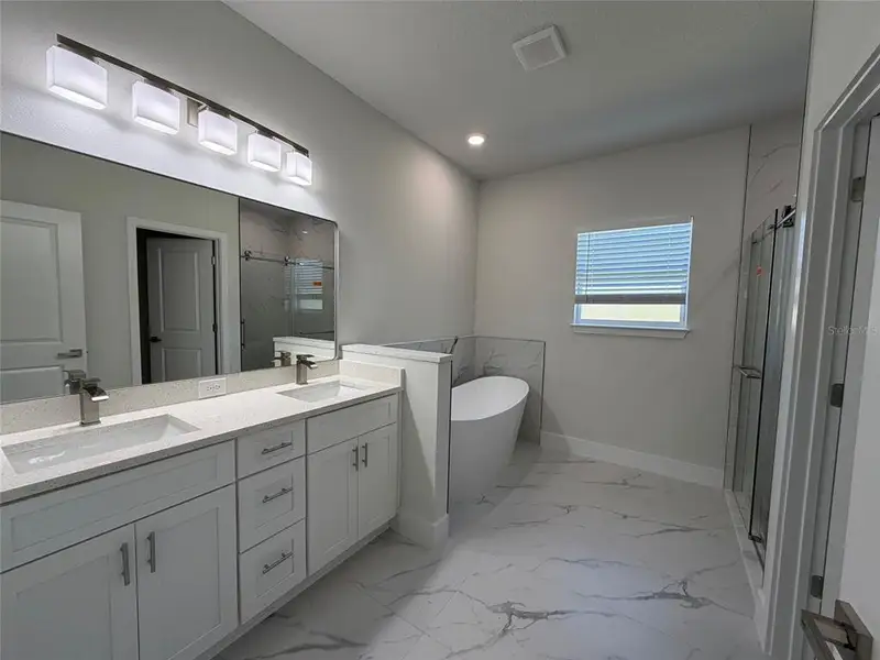 Furnished interior view inside a new home in , Dunnellon (Image 9).