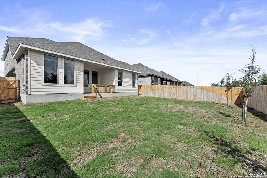 Exterior details and patio area of a home in , New Braunfels (Image 2).