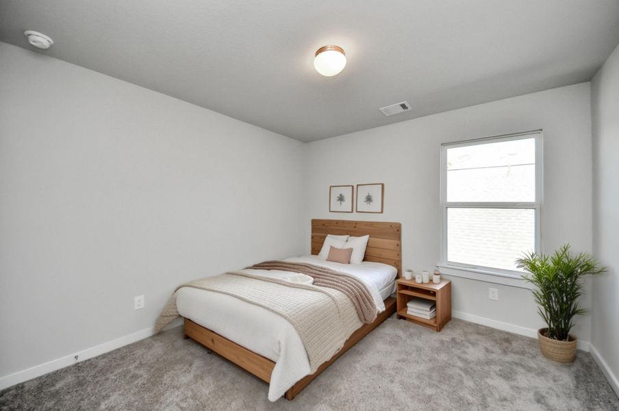 Virtually Staged - Secondary Bedroom. Sample photo of completed home with similar floor plan. Actual colors and selections may vary.