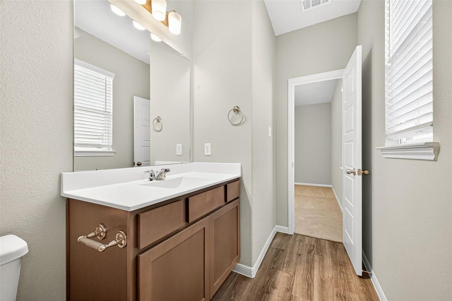 Furnished interior view inside a new home in Sunterra, Katy (Image 6).