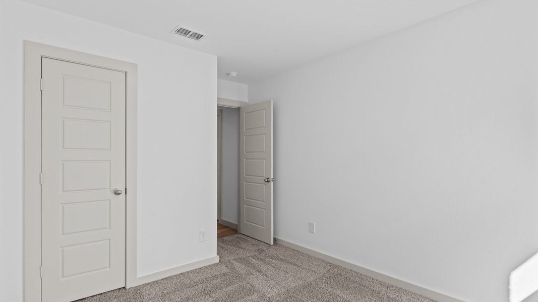 Representative unfurnished interior of a home built from the The Justin by D.R. Horton in Allen Farms, Lubbock (Image 22).