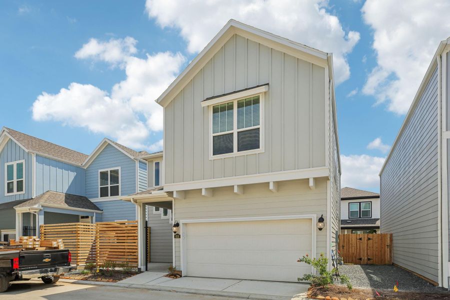 Front exterior of a new home in Kemah Crossing - Luxe Series, Kemah, TX, highlighting curb appeal (Image 19). Front exterior of a new home in Kemah Crossing - Luxe Series, Kemah, TX, highlighting curb appeal (Image 19).