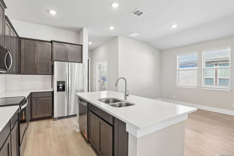 Furnished interior view inside a new home in Royal Crest, San Antonio (Image 7).