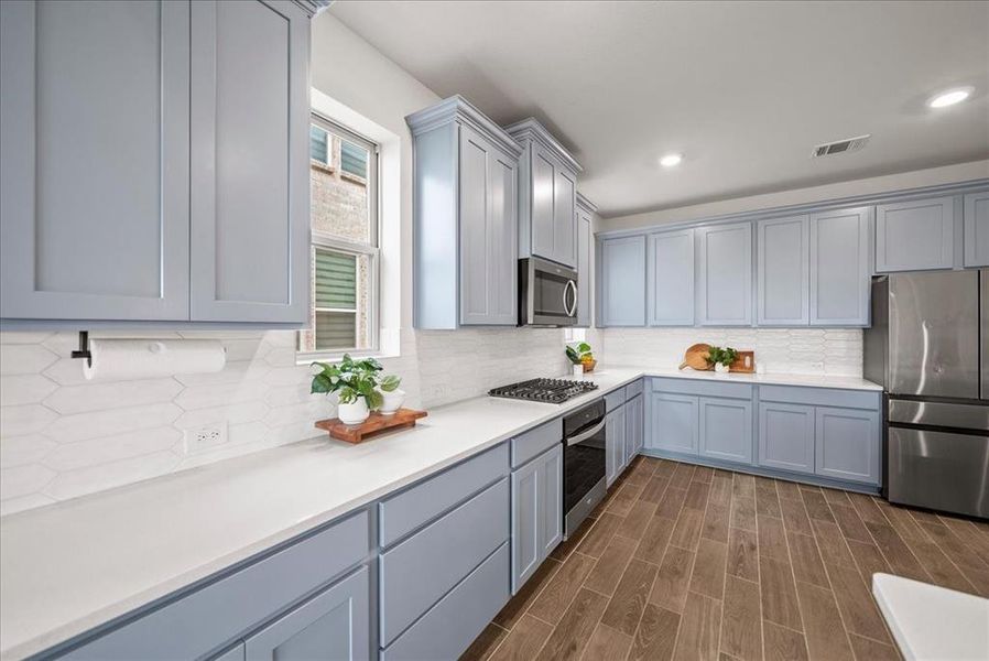 Furnished interior view inside a new home in , Little Elm (Image 26).