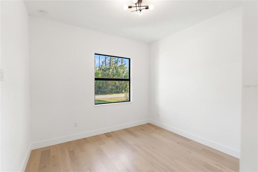 Spacious, unfurnished interior of a new home in , Port Charlotte (Image 26).