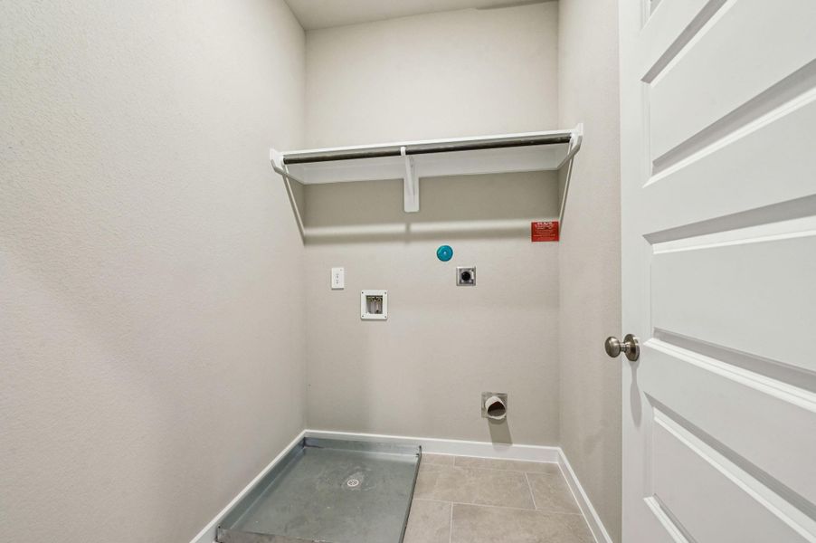 Photo is not of the actual home, but is an inspirational photo of builder’s model home and may depict options, furnishings, and/or decorator features that are not included