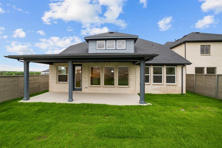 Front exterior of a new home in Treeline, Justin, TX, highlighting curb appeal (Image 1).