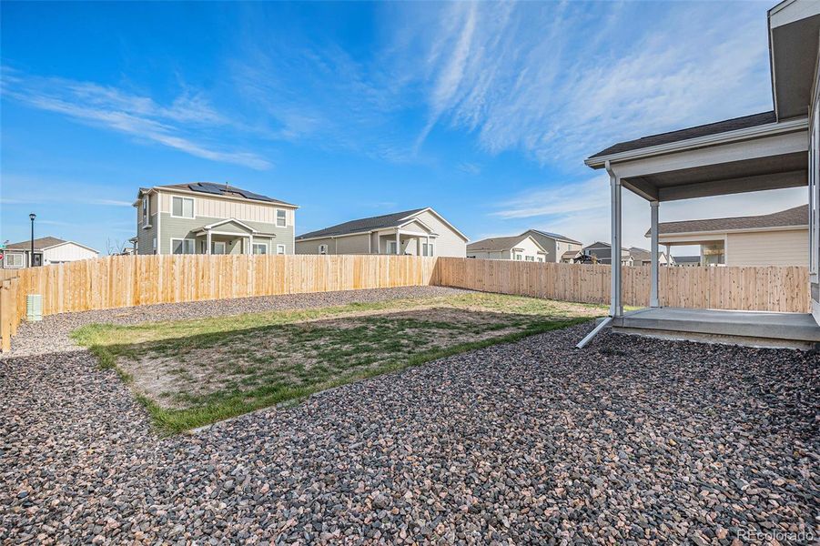 Exterior details and patio area of a home in Second Creek Farm, Commerce City (Image 2).