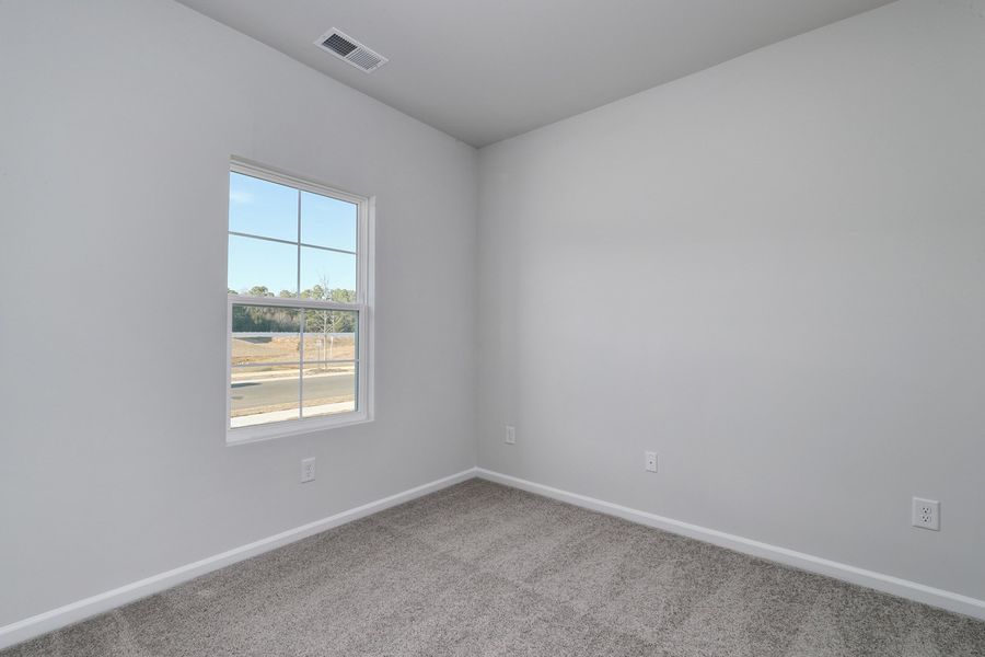 Spacious, unfurnished interior of a new home in Hainer Place, Conway (Image 34).